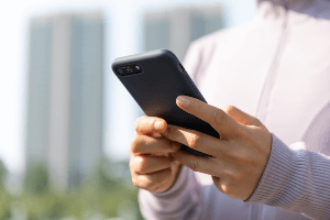 person texting on phone