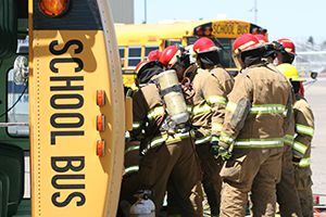 school bus on its side