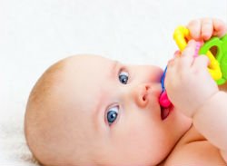 baby with teething ring