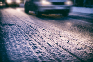 car traveling on snowy road