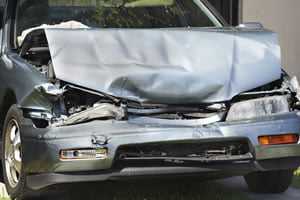 car with crashed hood and bumper
