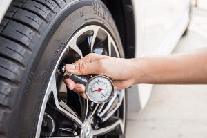 checking tire pressure