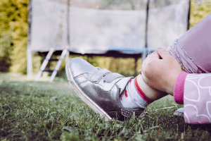 child holding shin