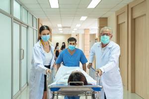 doctors around a patient
