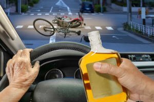 driver holding bottle