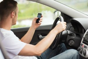 driver looking at phone