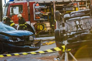 two damaged vehicles with fire truck