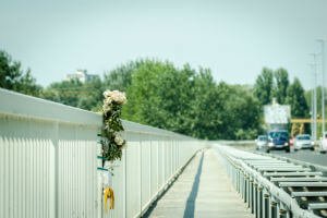 flowers on a bridge rail