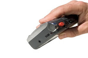 hand holding a voice recorder