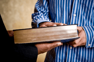 hand on a bible