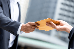 handing over a letter