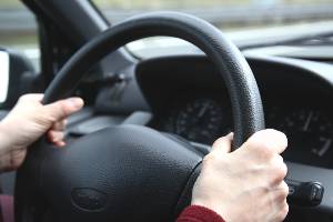hands on steering wheel