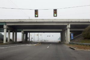 traffic lights near a bridge