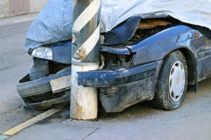 car crashed into pilon