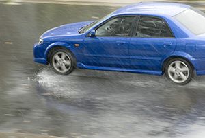 car driving in rain
