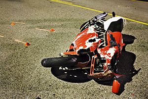 motorcycle crashed and on its side