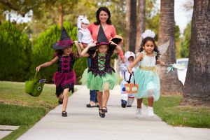 parent with trick or treaters
