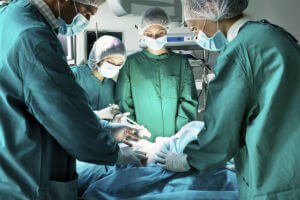 person in surgery