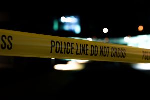 yellow police line at night