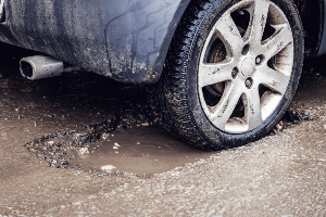 road with pot hole