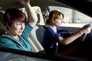 two women bracing for a car crash accident