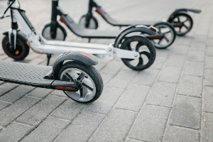 scooters on a sidewalk