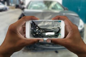 taking picture of a crashed car