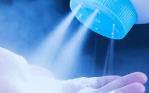 talcum powder pouring from a bottle