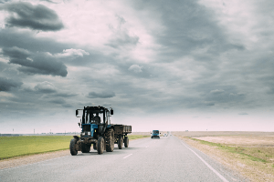 tractor driving on the road