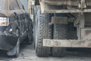 truck tire crashed into car