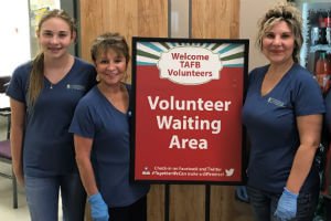 volunteers at a food bank