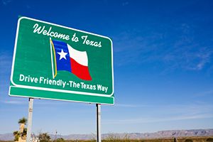 welcome to texas road sign