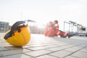 hard hat next to fallen worker
