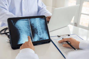 dr looking at an xray