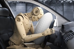 airbag injuries - crash test dummy