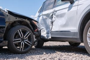 wrecked cars during daytime