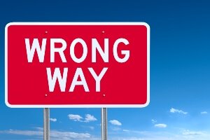 close up picture of a wrong way road sign